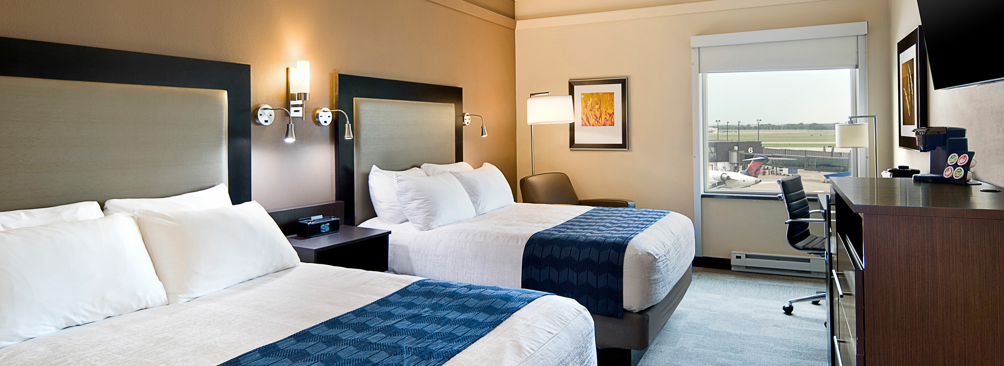 Double queen room with runway view